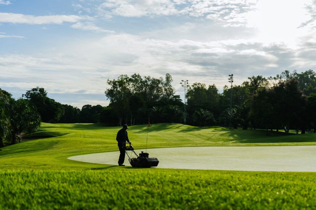 Mowing a large green lawn
